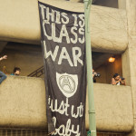 banner hang in oakland during general strike